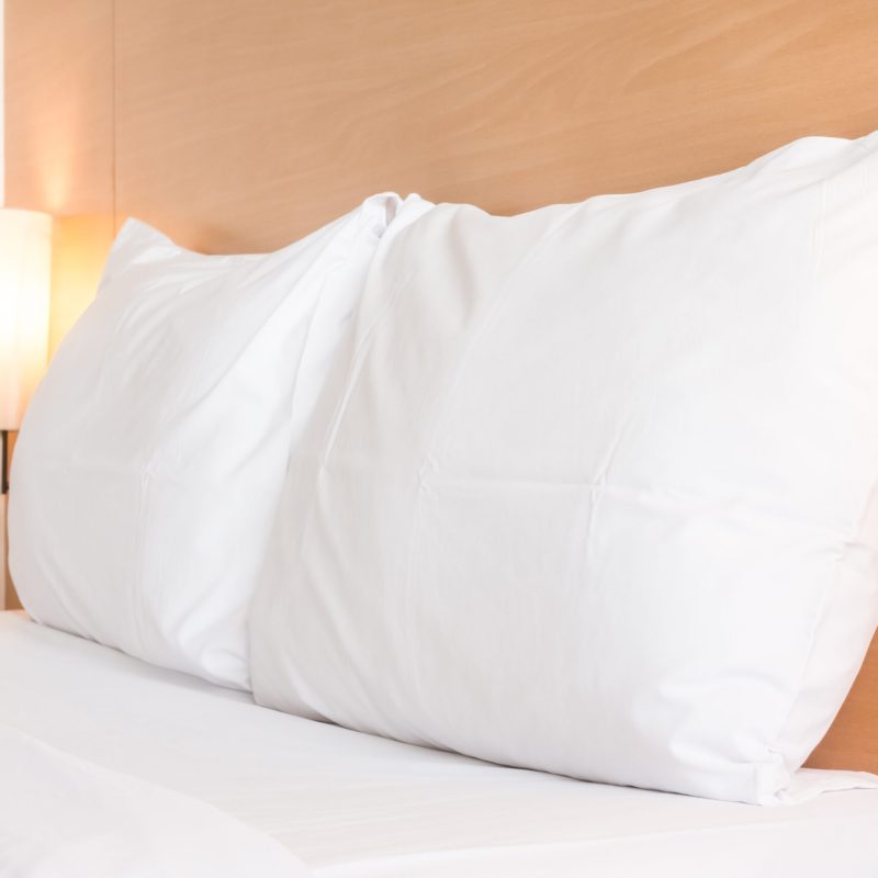 White pillow on bed decoration in bedroom interior